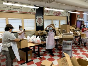 SUHSD operated a dozen drive-through Grab & Go distribution centers that served seven breakfasts and seven lunches packaged together for a total of 14 meals a week.